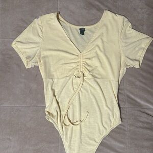 Yellow wild fable onesie